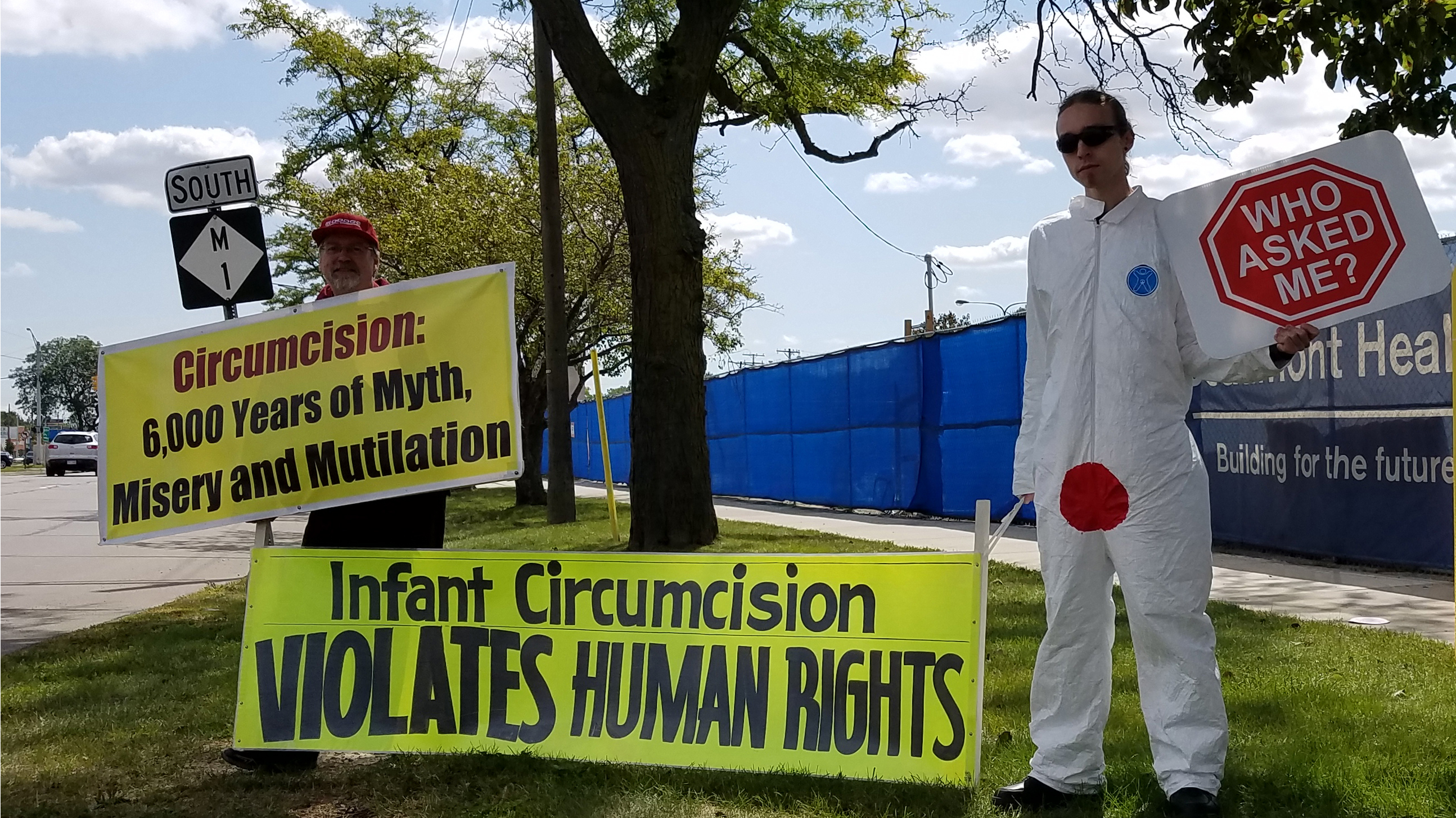 Pretransition Vvn with anti-circumcision signs at march
