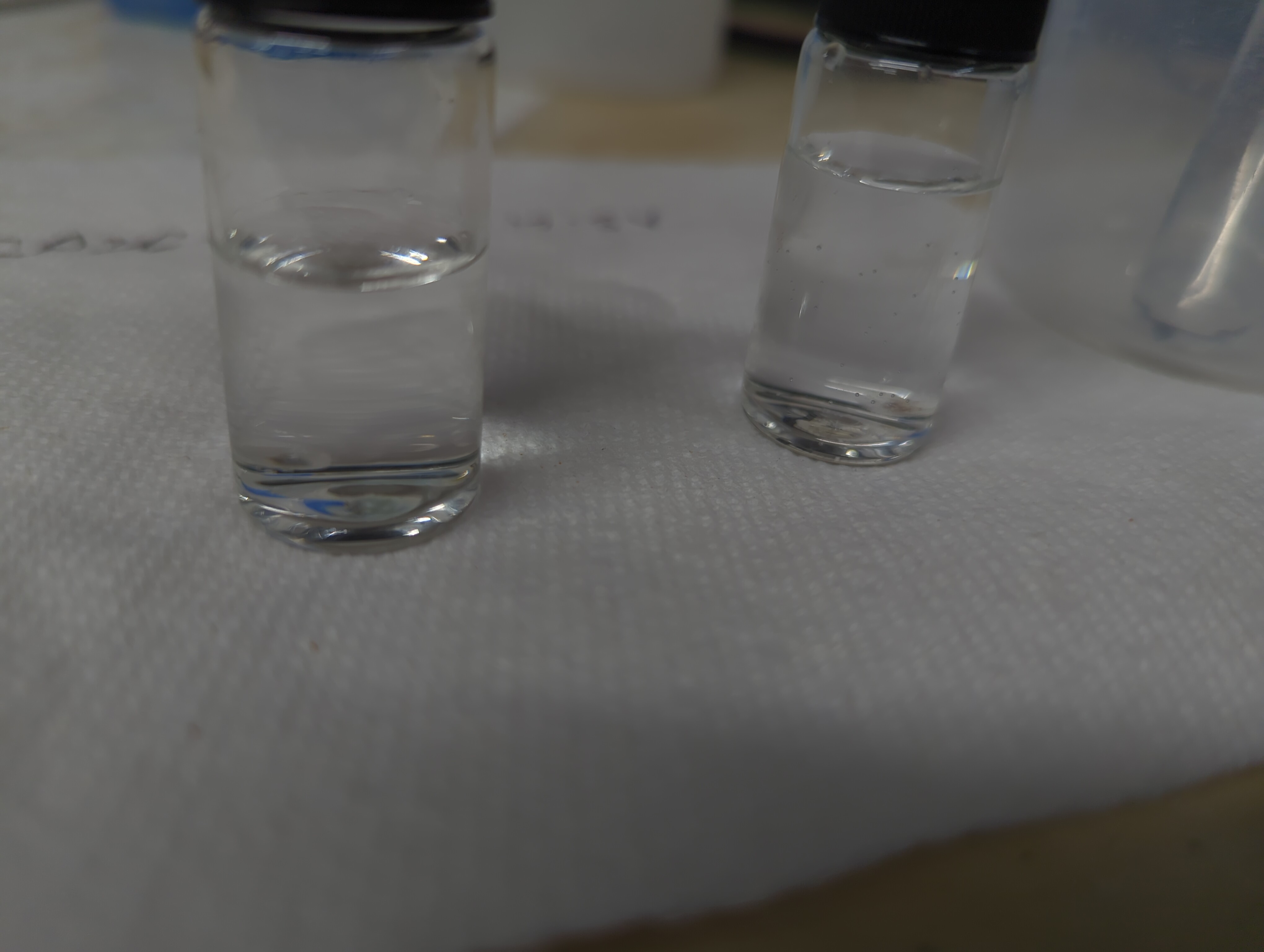 Beads of flesh in vials of a clear chemical
